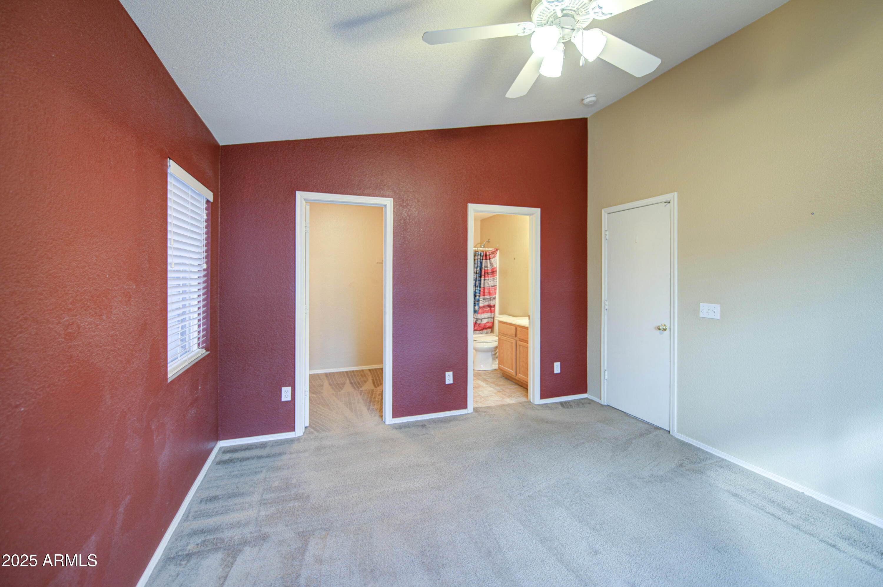 11465 East Cicero Street Mesa, AZ 85207 - Photo 18 of 36 a view of an empty room with chandelier fan