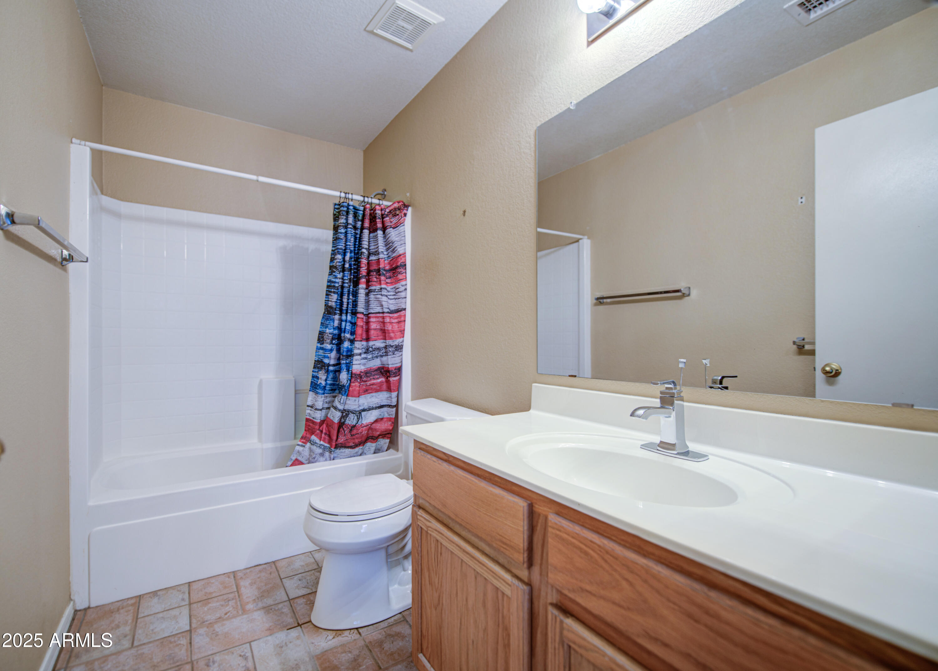 11465 East Cicero Street Mesa, AZ 85207 - Photo 22 of 36 a bathroom with a sink a toilet and a bathtub