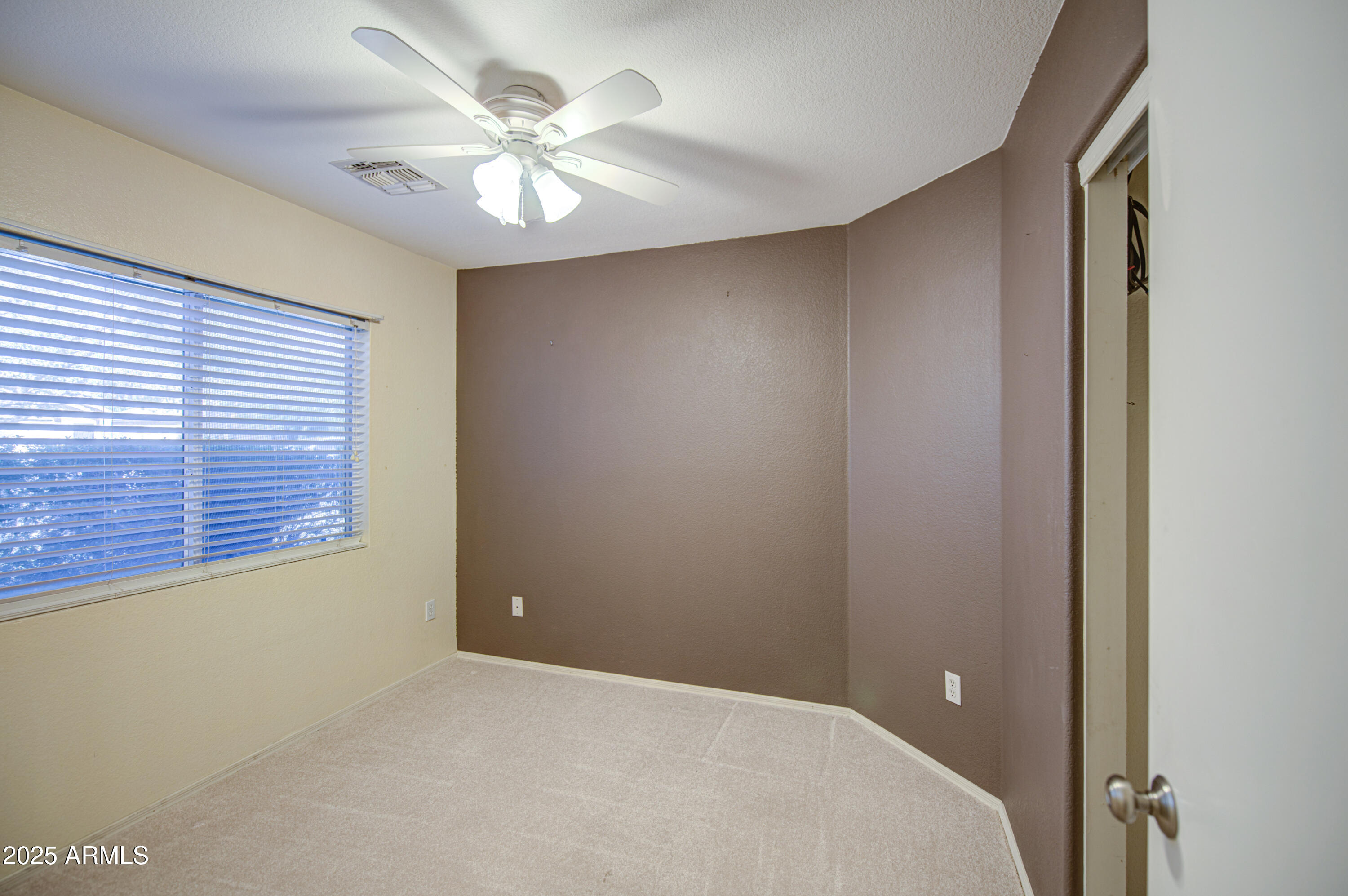 11465 East Cicero Street Mesa, AZ 85207 - Photo 24 of 36 a view of an empty room with a window
