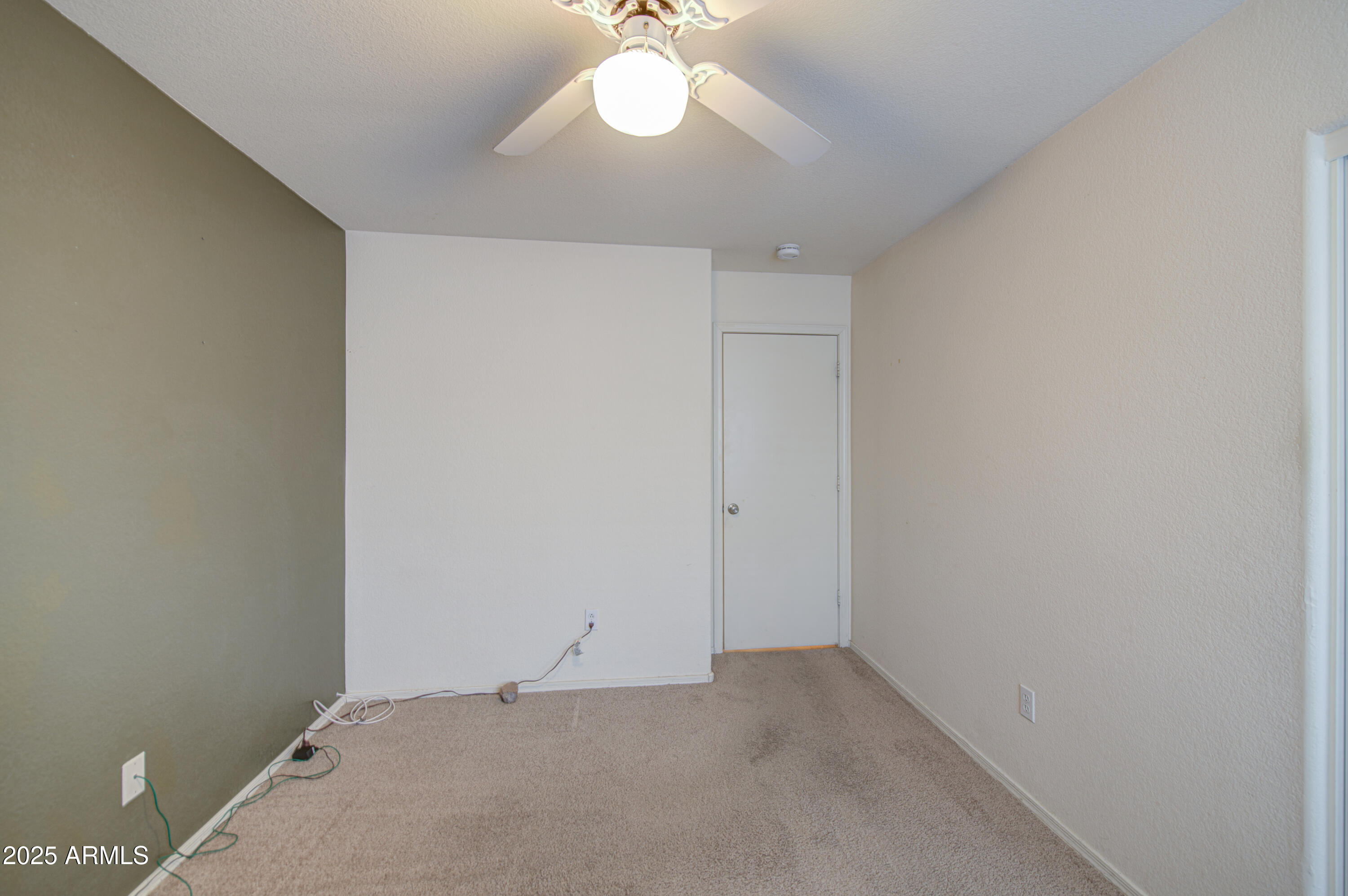 11465 East Cicero Street Mesa, AZ 85207 - Photo 27 of 36 a view of a room with a ceiling fan and a window