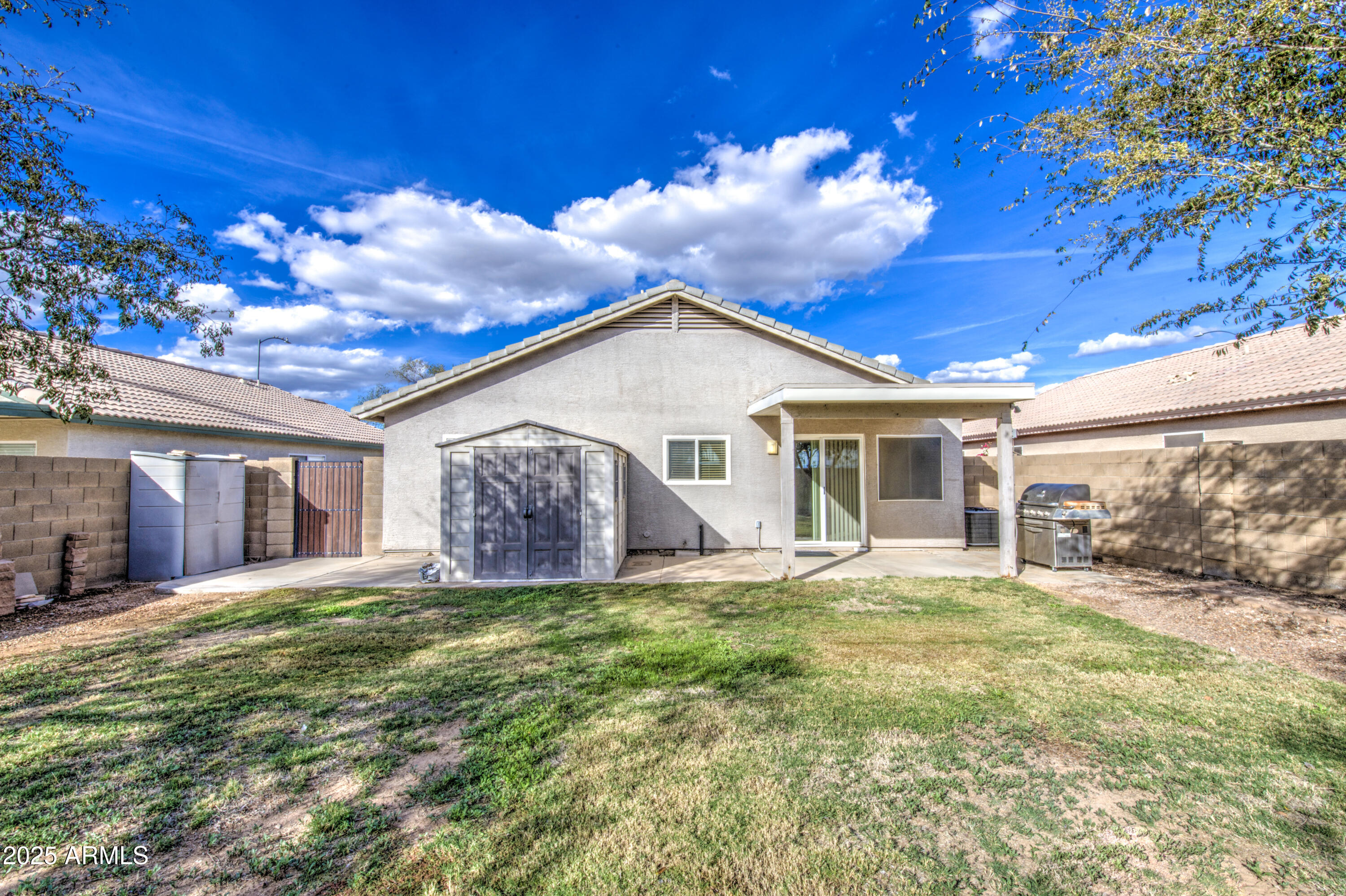 11465 East Cicero Street Mesa, AZ 85207 - Photo 33 of 36 a view of a house with a yard