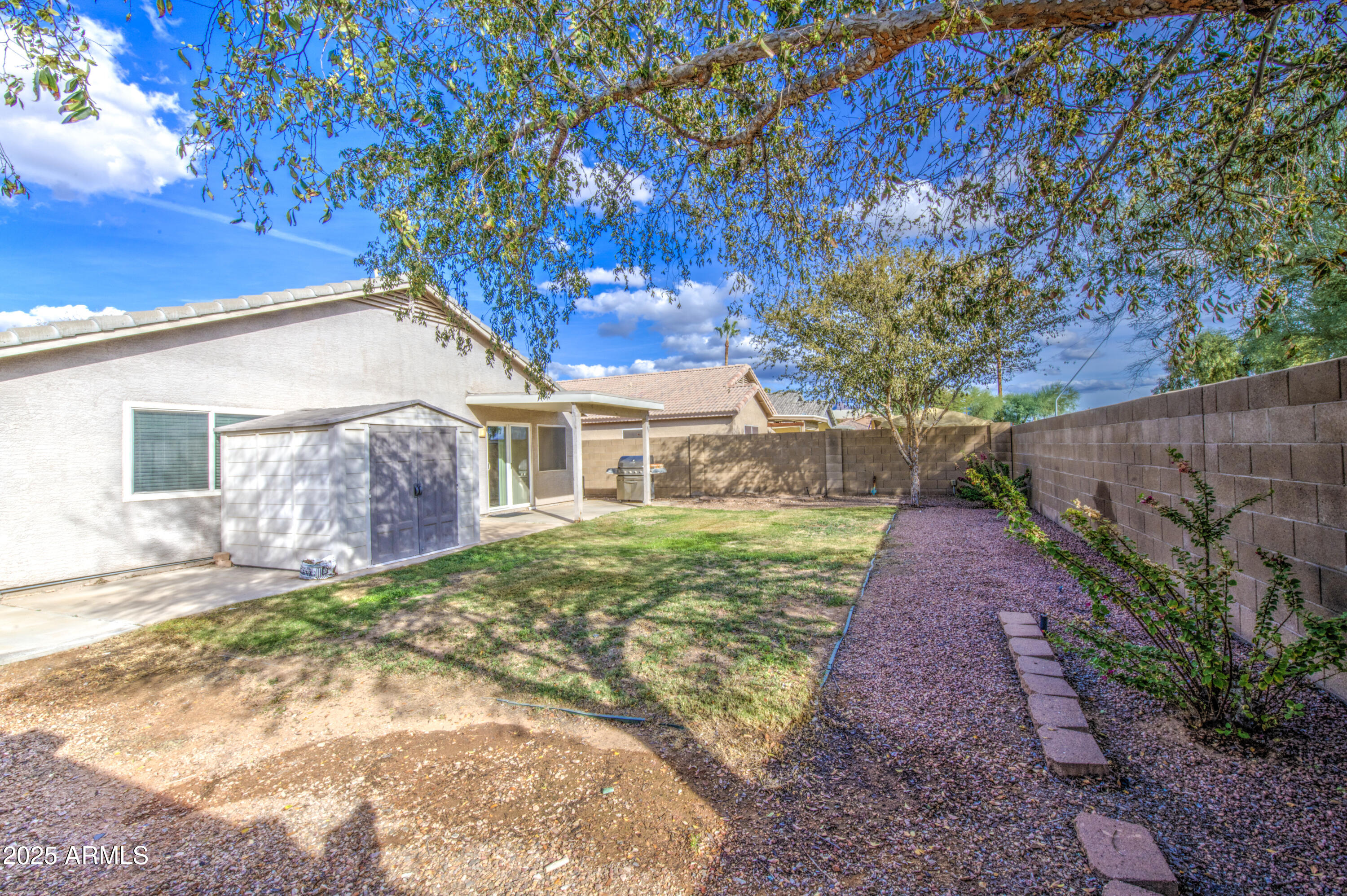 11465 East Cicero Street Mesa, AZ 85207 - Photo 34 of 36 a front view of a house with a yard