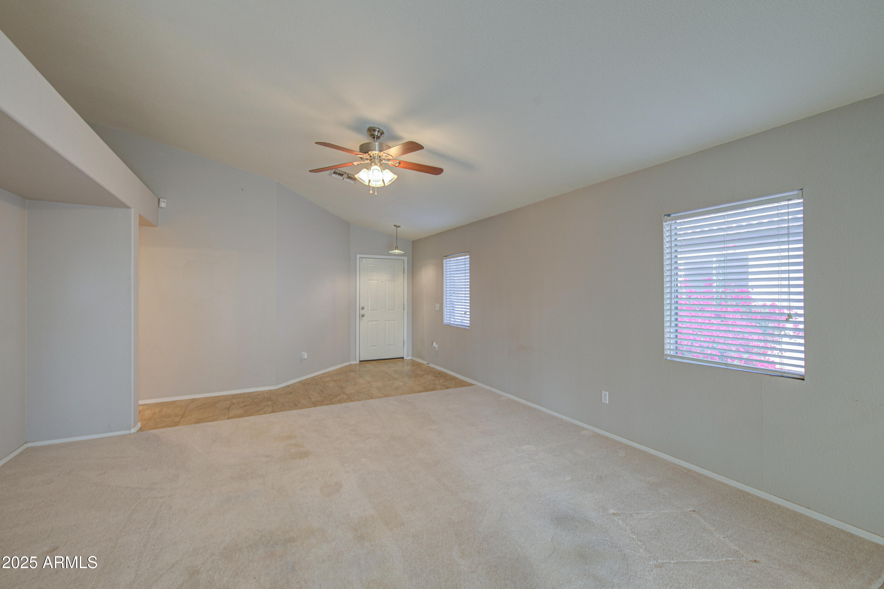 11465 East Cicero Street Mesa, AZ 85207 - Photo 9 of 36 a view of an empty room with a window