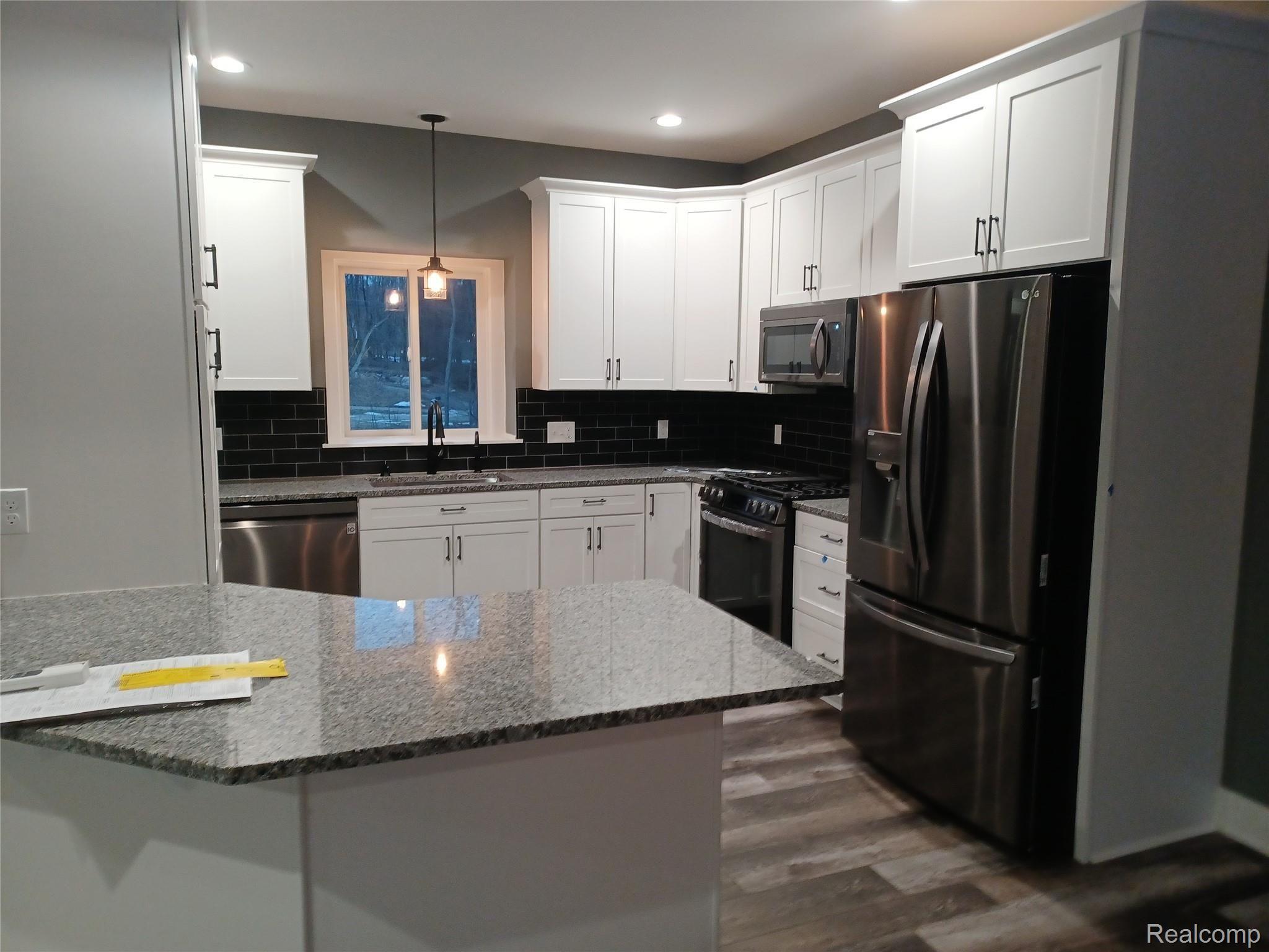 13270 Germany Road Fenton, MI 48430 - Photo 4 of 15 Granite countertops with pantry