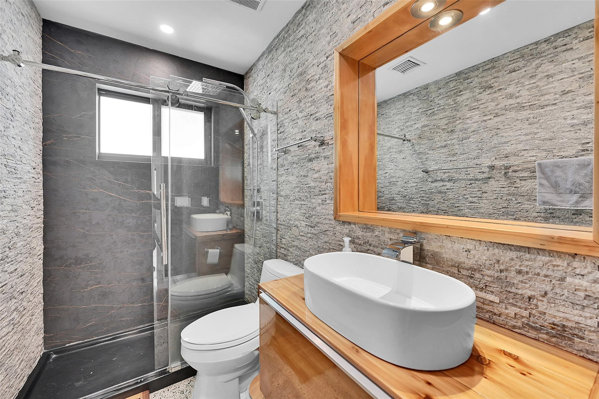 535 Northeast 113th Street Miami, FL 33161 - Photo 11 of 47 Beautifully renovated Step in shower.