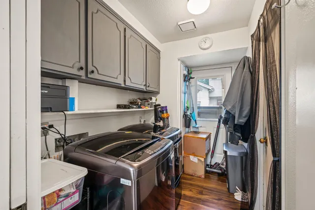 a kitchen with a stove and a refrigerator