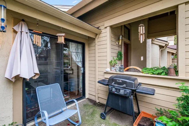 a room with furniture and a chair