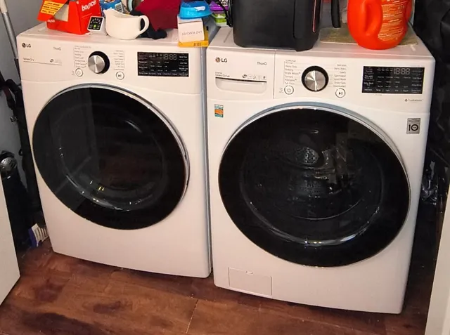 a utility room with dryer and washer