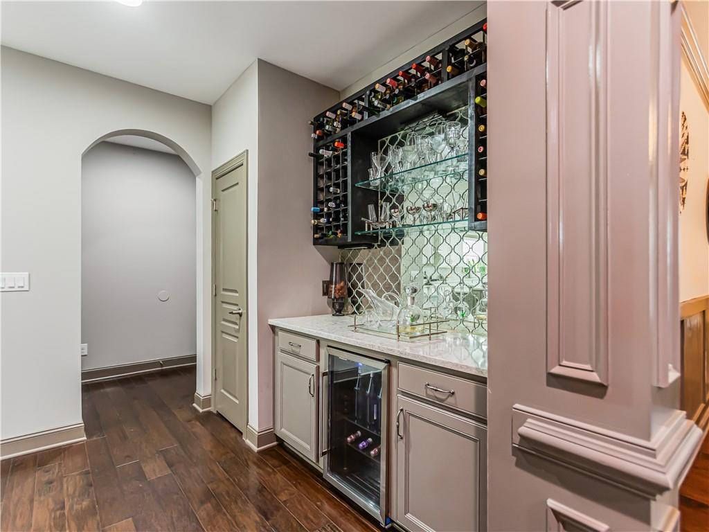 3820 Mabry Ridge Drive Buford, GA 30518 - Photo 14 of 55 a kitchen with a refrigerator and a stove