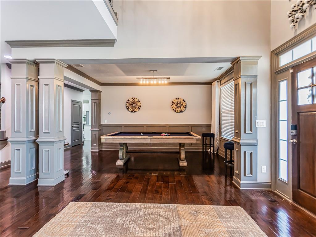 3820 Mabry Ridge Drive Buford, GA 30518 - Photo 18 of 55 a view of a hallway with wooden floor and staircase