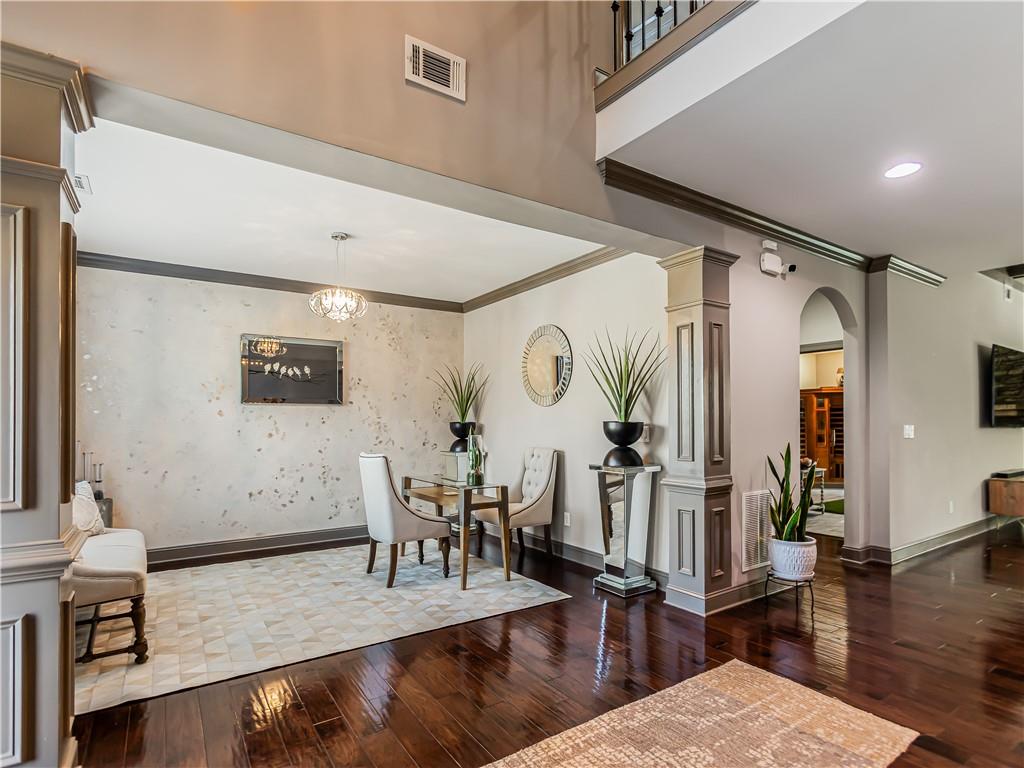 3820 Mabry Ridge Drive Buford, GA 30518 - Photo 19 of 55 a view of a living room and dining room