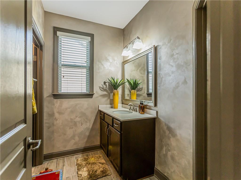 3820 Mabry Ridge Drive Buford, GA 30518 - Photo 25 of 55 a bathroom with a sink toilet and window