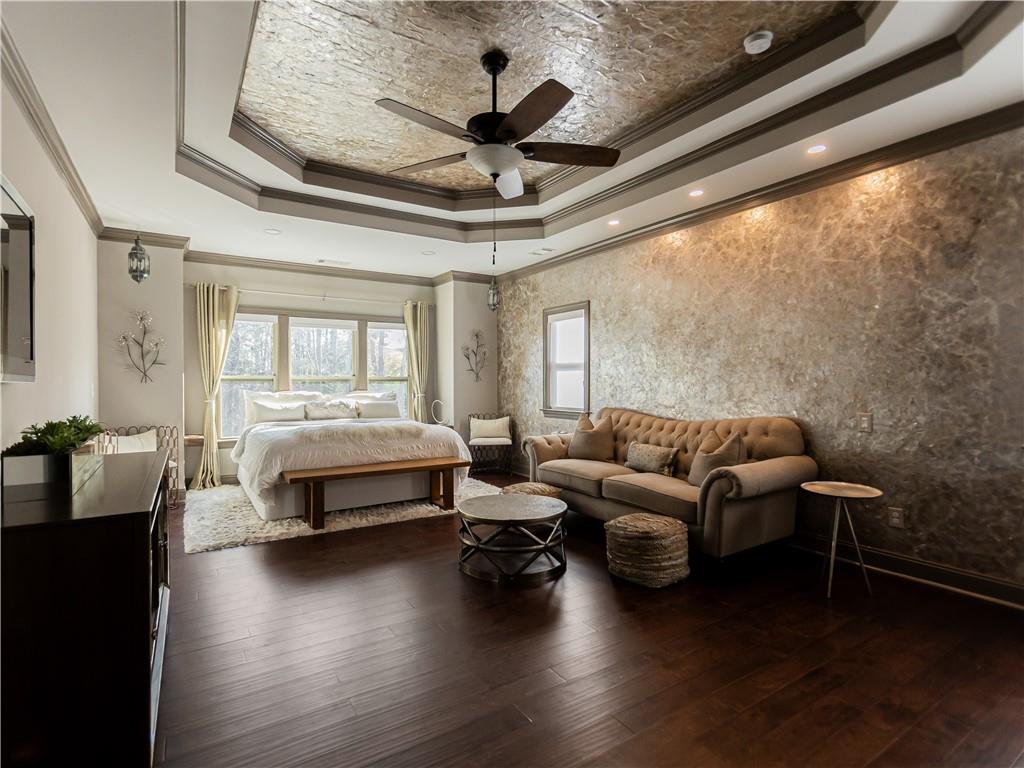 3820 Mabry Ridge Drive Buford, GA 30518 - Photo 30 of 55 a spacious bedroom with furniture and a large window