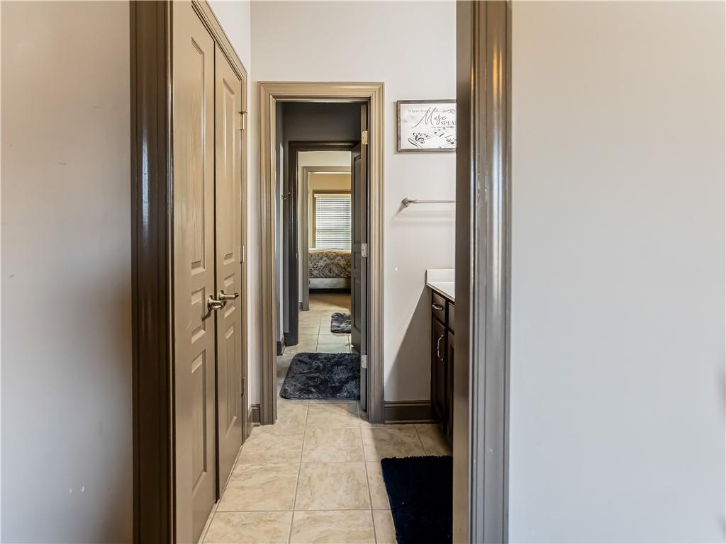 3820 Mabry Ridge Drive Buford, GA 30518 - Photo 40 of 55 a view of a bathroom from a hallway