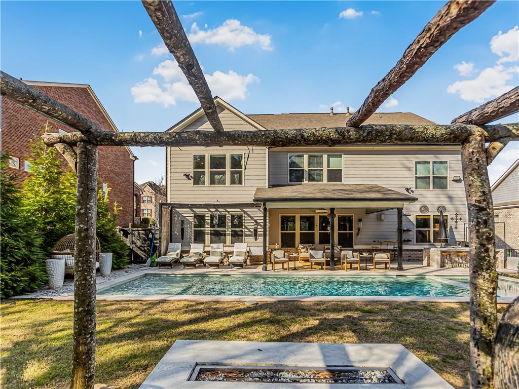 3820 Mabry Ridge Drive Buford, GA 30518 - Photo 53 of 55 a front view of a house with swimming pool