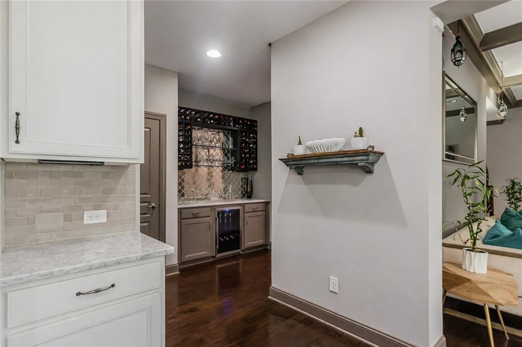 3820 Mabry Ridge Drive Buford, GA 30518 - Photo 6 of 55 a kitchen with a refrigerator and a stove
