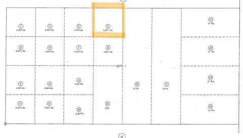 a picture of a bathroom with a shower