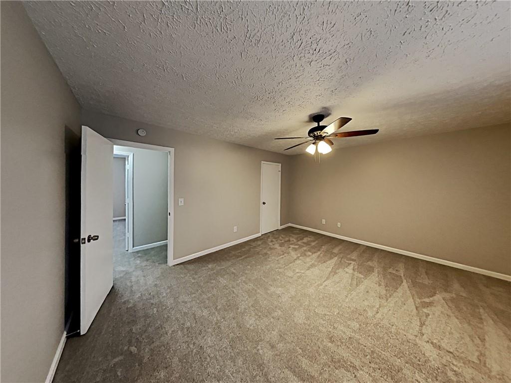 3548 Cherokee Overlook Drive Canton, GA 30115 - Photo 6 of 24 wooden floor in an empty room