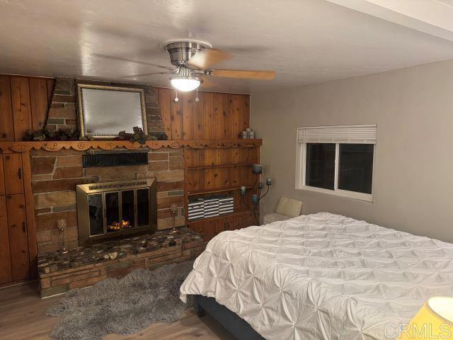 8762 Tyler Street, Unit A Spring Valley, CA 91977 - Photo 19 of 28 a bedroom with a bed and a flat screen tv