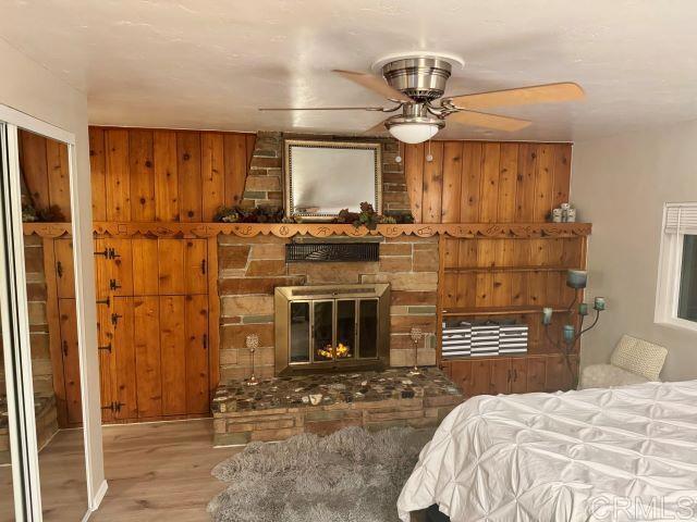 8762 Tyler Street, Unit A Spring Valley, CA 91977 - Photo 20 of 28 a bedroom with a bed and a chandelier