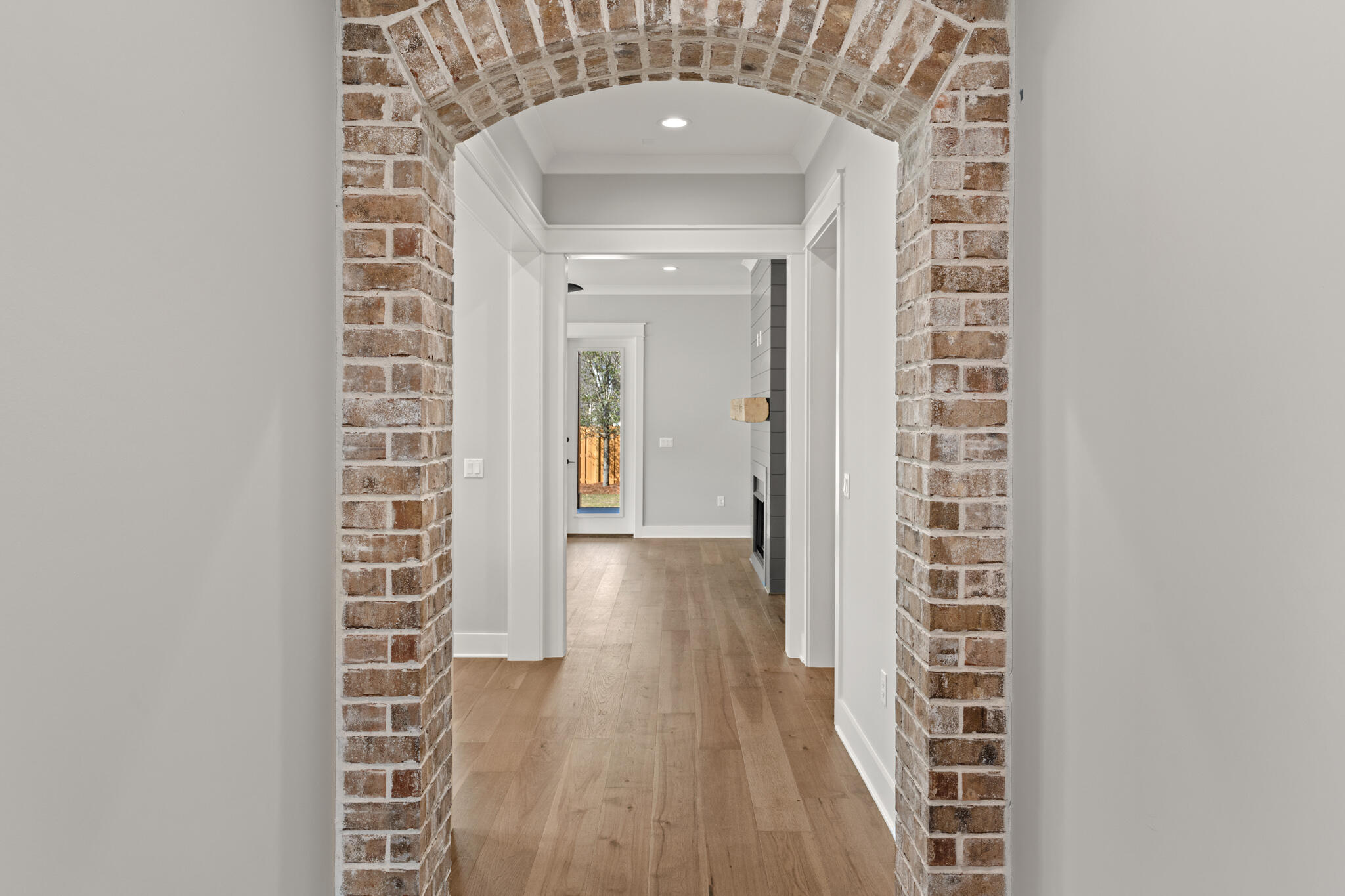 19 Caymus Cove Freeport, FL 32439 - Photo 8 of 41 a view of a hallway with wooden floor and entryway