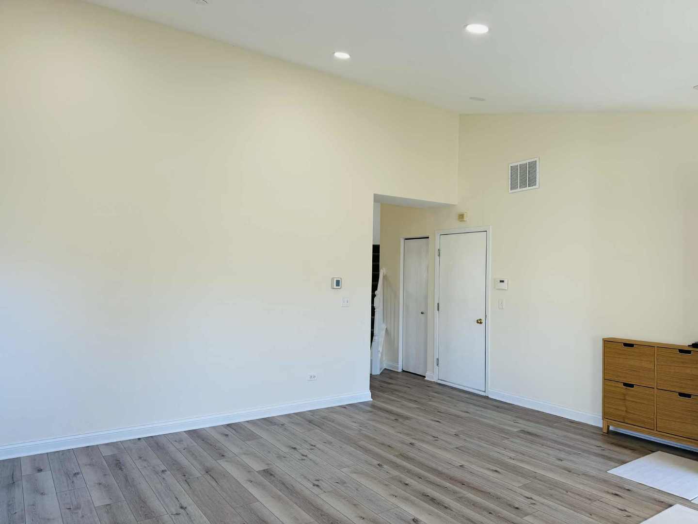 425 Claire Avenue Romeoville, IL 60446 - Photo 11 of 20 a view of an empty room with wooden floor and closet