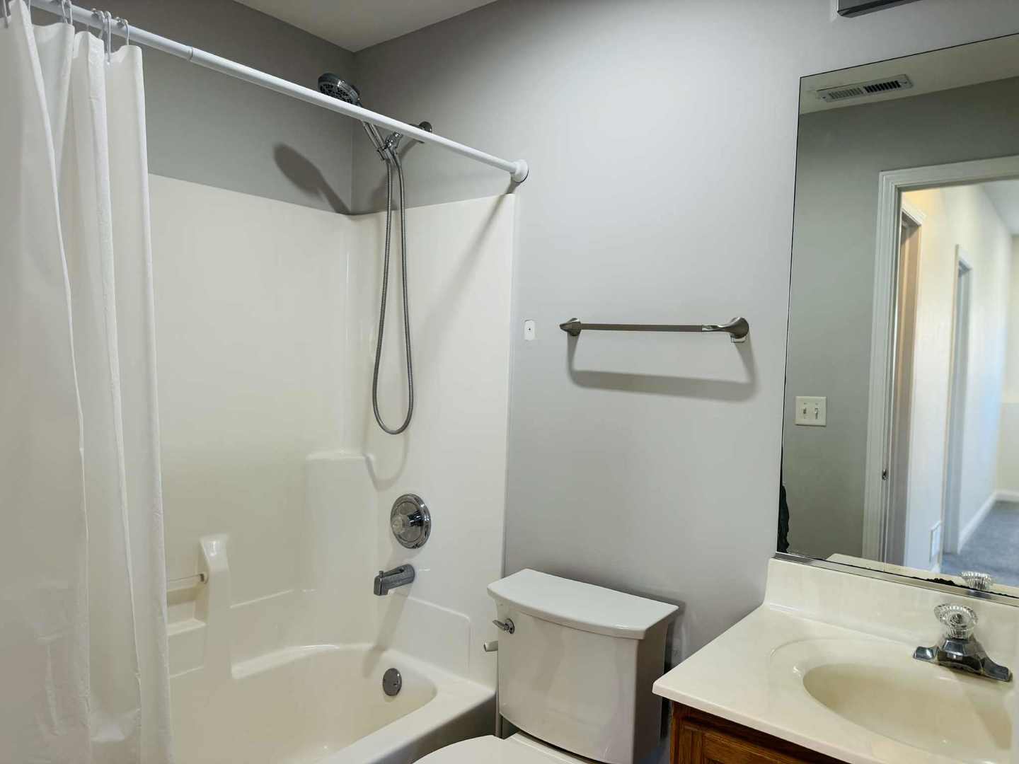 425 Claire Avenue Romeoville, IL 60446 - Photo 13 of 20 a bathroom with a shower curtain and a sink