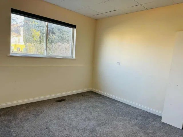 an empty room with a window