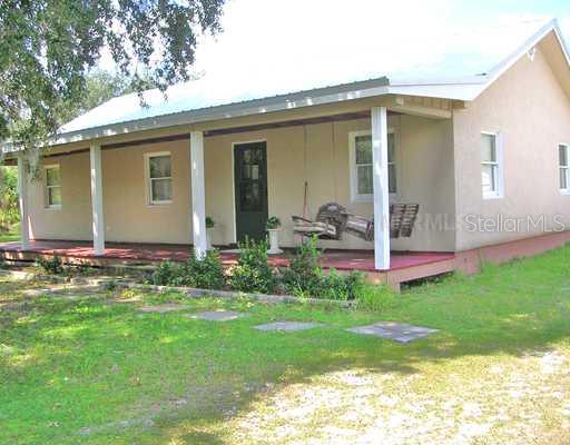 31006 Lake Mack Road DeLand, FL 32720 - Photo 1 of 1 a front view of house with yard