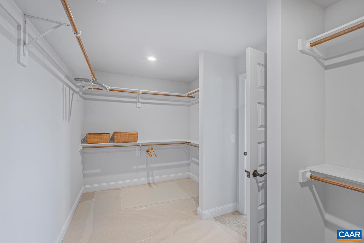 2 Agatha Ridge Lane, Unit LOT 2 Crozet, VA 22932 - Photo 27 of 42 a view of storage and utility room with washer and dryer