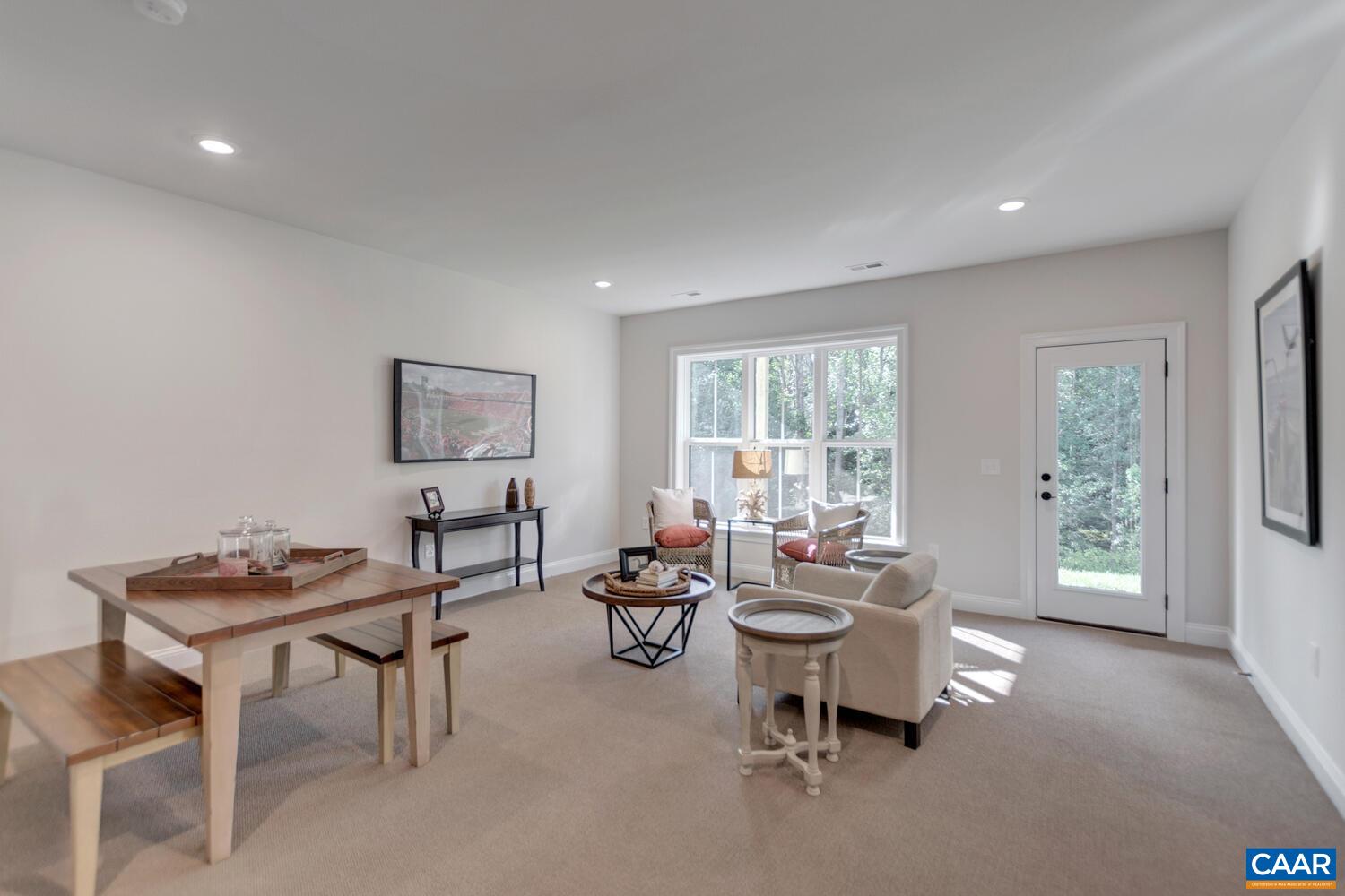 2 Agatha Ridge Lane, Unit LOT 2 Crozet, VA 22932 - Photo 36 of 42 a living room with furniture and a window