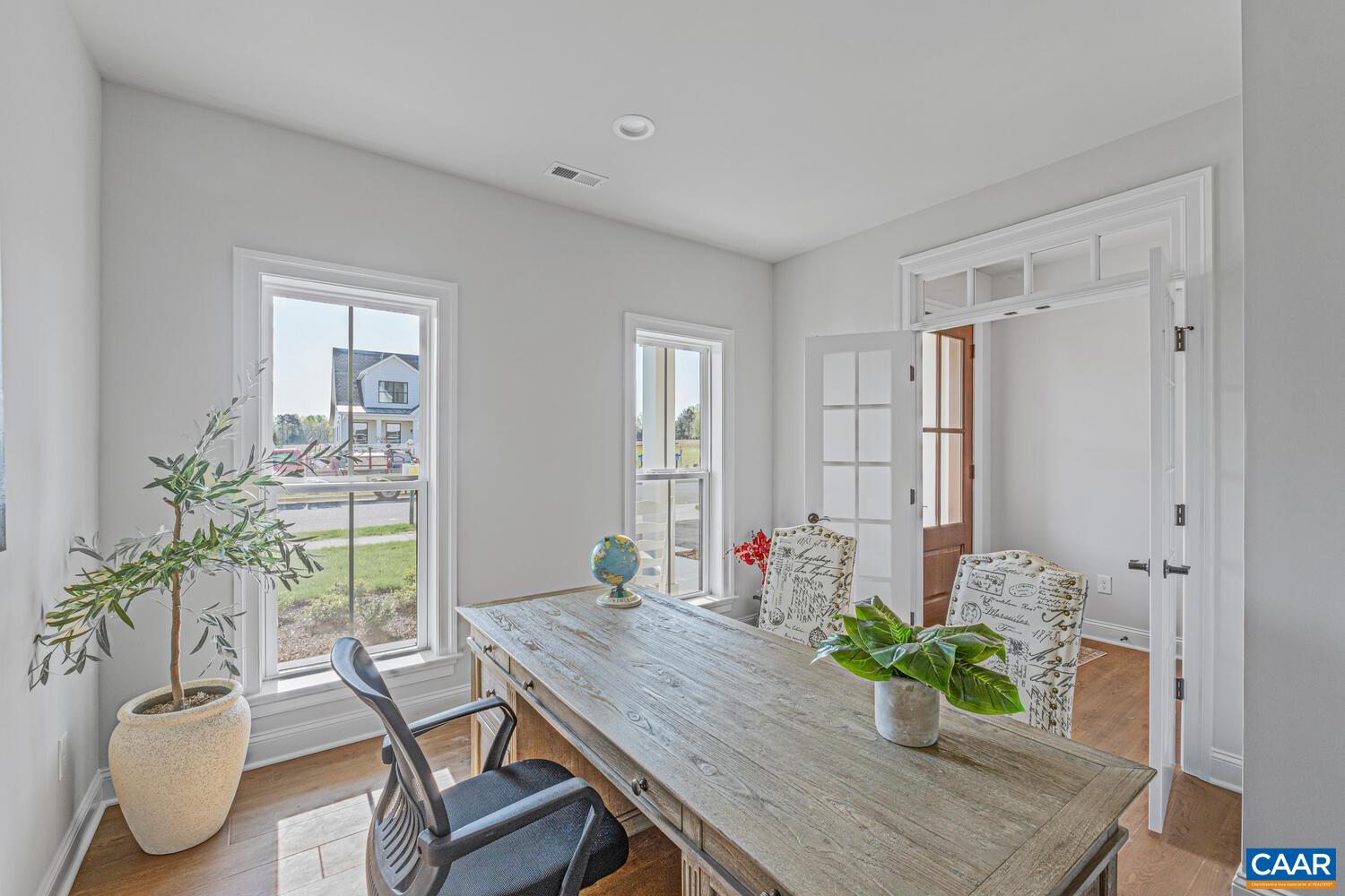 2 Agatha Ridge Lane, Unit LOT 2 Crozet, VA 22932 - Photo 7 of 42 a room with furniture and potted plant