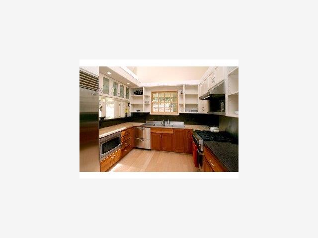 371 Quail Canyon Watsonville, CA 95076 - Photo 3 of 9 a kitchen with stainless steel appliances granite countertop a sink and a stove