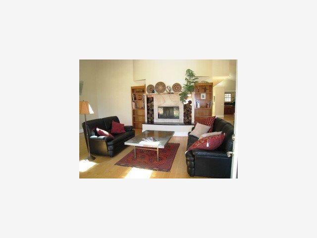 371 Quail Canyon Watsonville, CA 95076 - Photo 4 of 9 a living room with furniture and a floor to ceiling window