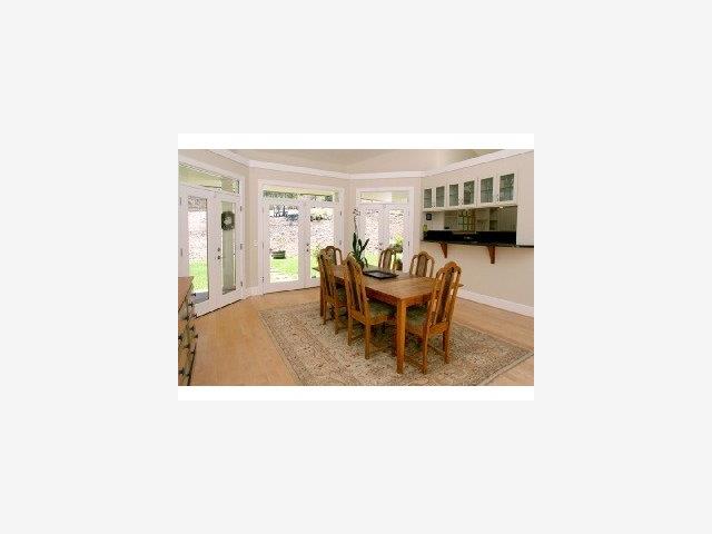 371 Quail Canyon Watsonville, CA 95076 - Photo 5 of 9 a living room with a table and chairs