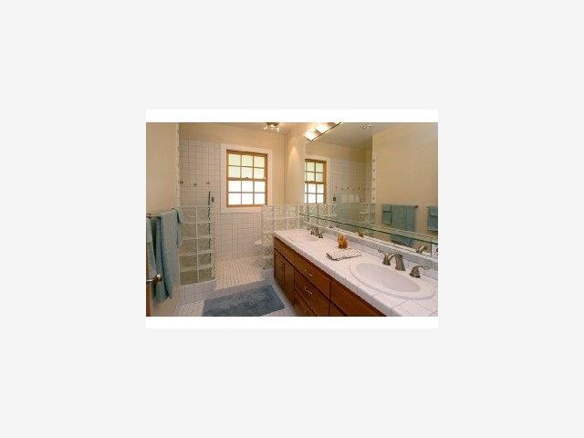 371 Quail Canyon Watsonville, CA 95076 - Photo 7 of 9 a open living room with a sink and a mirror