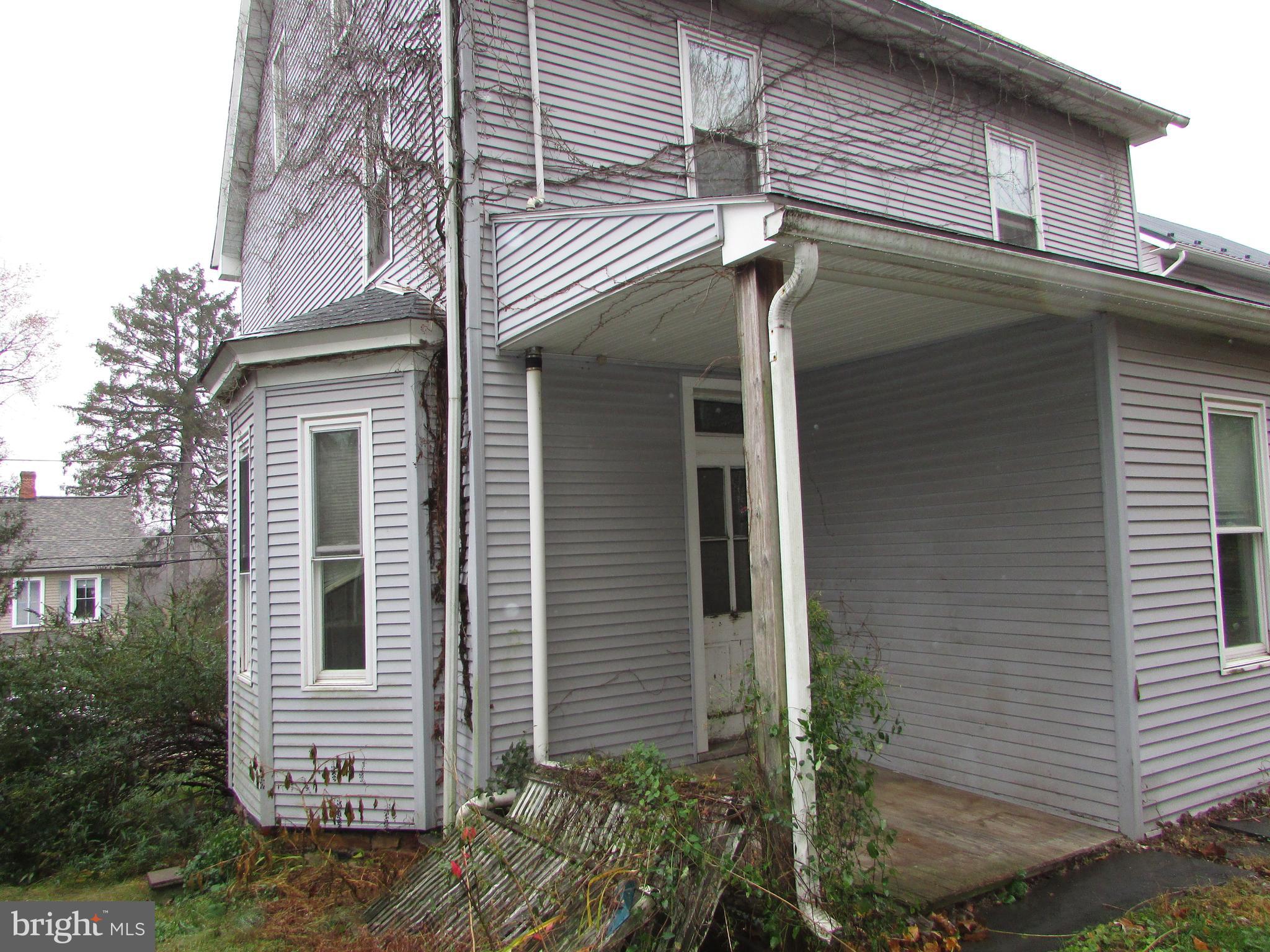 910 Main Street Delta, PA 17314 - Photo 12 of 20 a view of a house with a window and door