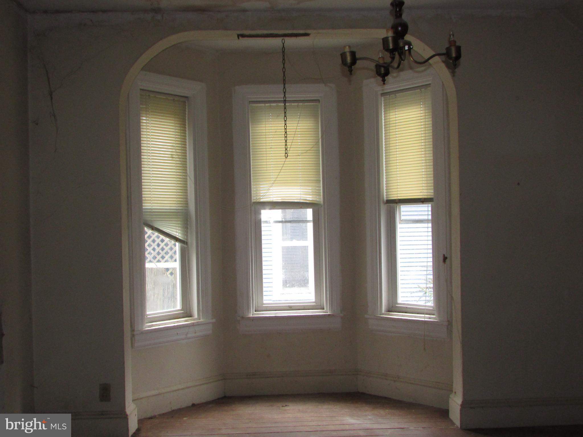 910 Main Street Delta, PA 17314 - Photo 6 of 20 an empty room that has a window