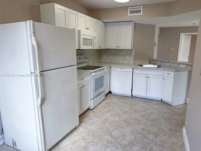 $2,460 | 8781 Wiles Road, Unit 108, Coral Springs, FL 33067