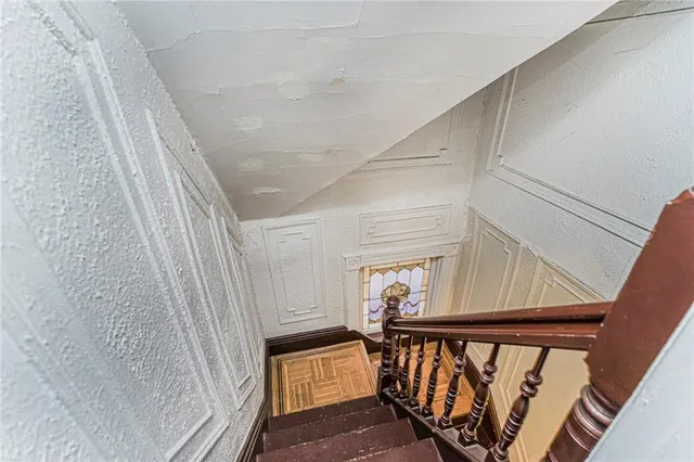 a view of an entryway with stairs