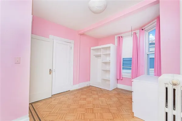 a view of room with air conditioner and window