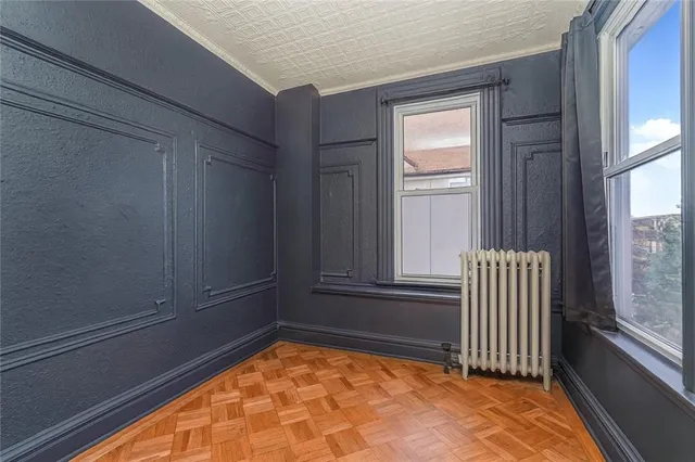 a view of a closet area with an empty room