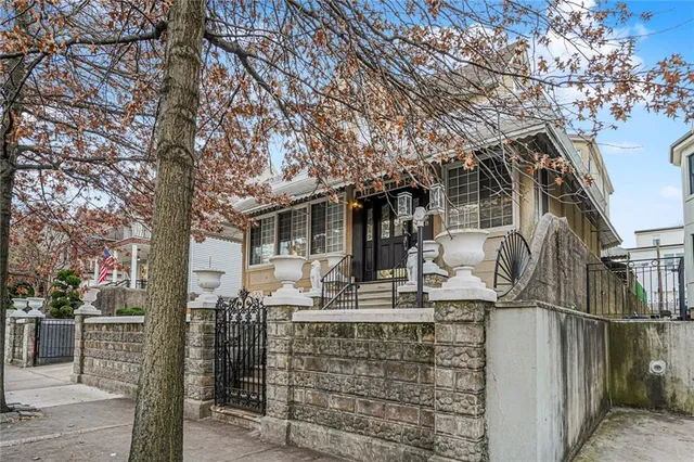 a front view of house with street view