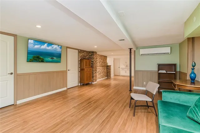 a view of a livingroom with furniture and wooden floor