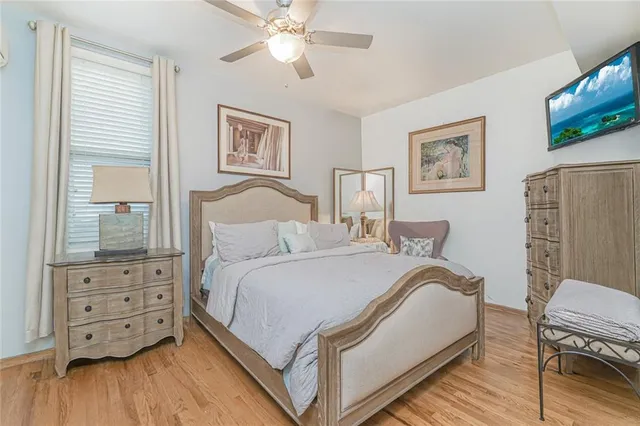 a bedroom with a bed and a closet