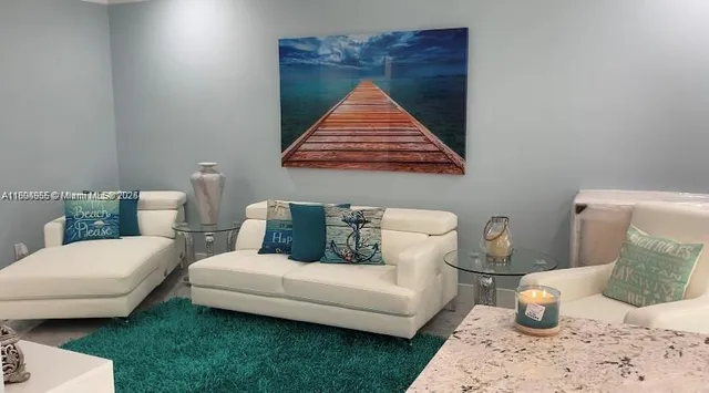 a living room with furniture and a couch