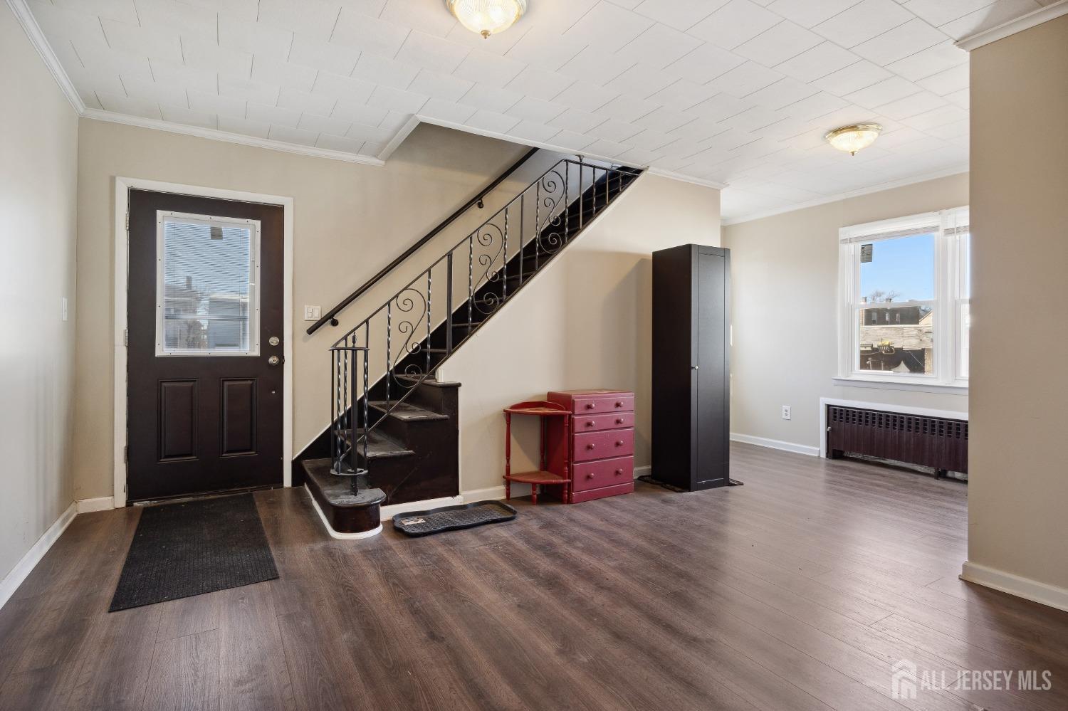 123 Madison Avenue Perth Amboy, NJ 08861 - Photo 11 of 30 a view of entryway and hall with wooden floor