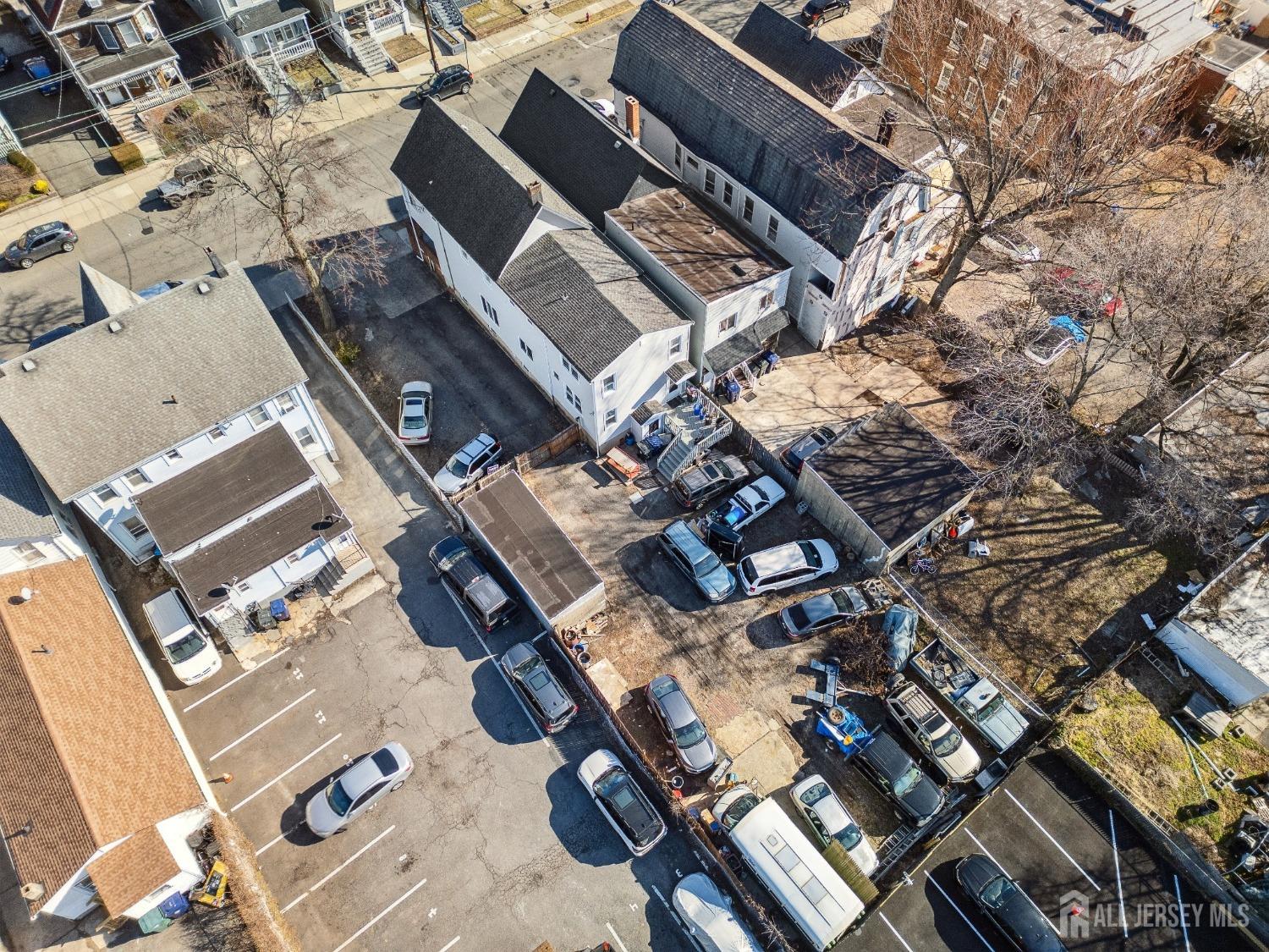 123 Madison Avenue Perth Amboy, NJ 08861 - Photo 29 of 30 an aerial view of a house with backyard