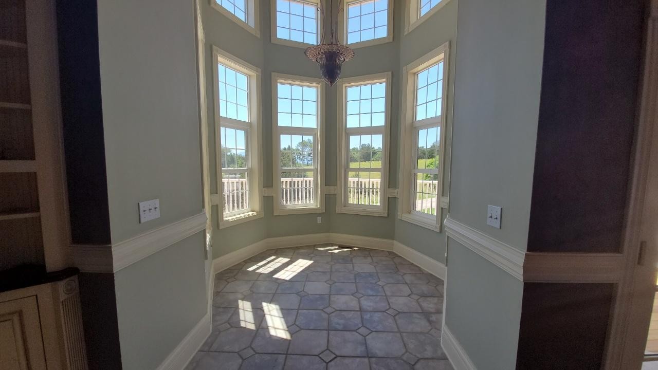 1387 Harold Patterson Road Dandridge, TN 37725 - Photo 18 of 38 a view of an empty room with a window