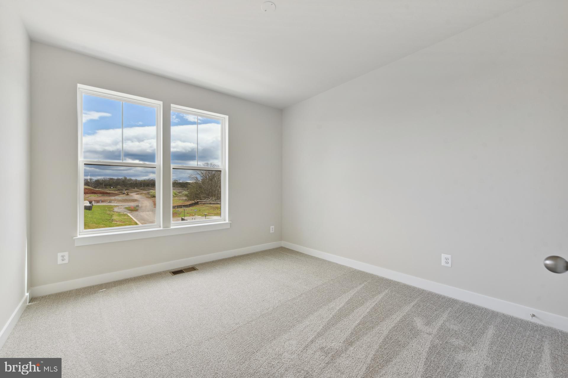 20783 Rumbullion Drive Sterling, VA 20166 - Photo 13 of 20 an empty room with a window